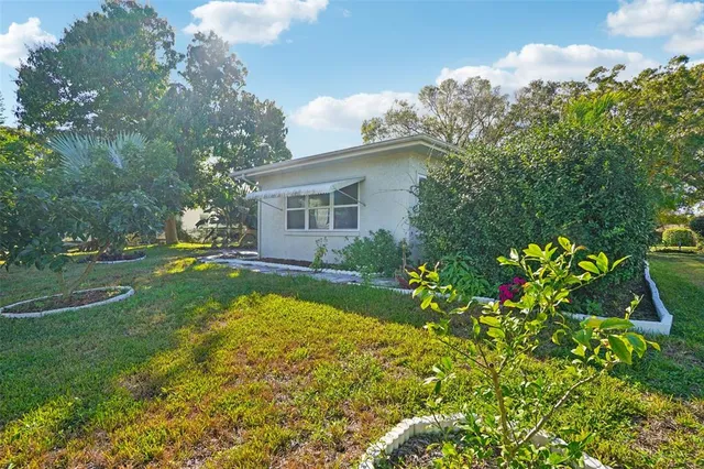 a view of a house with swimming pool