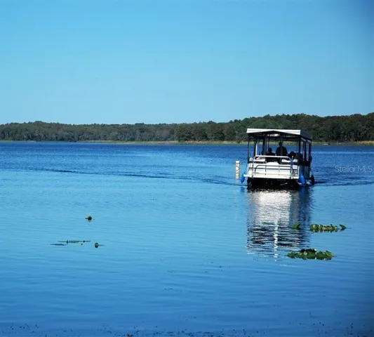 a view of water with mountain view