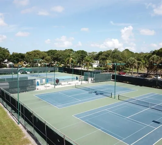 a view of an outdoor space and tennis court
