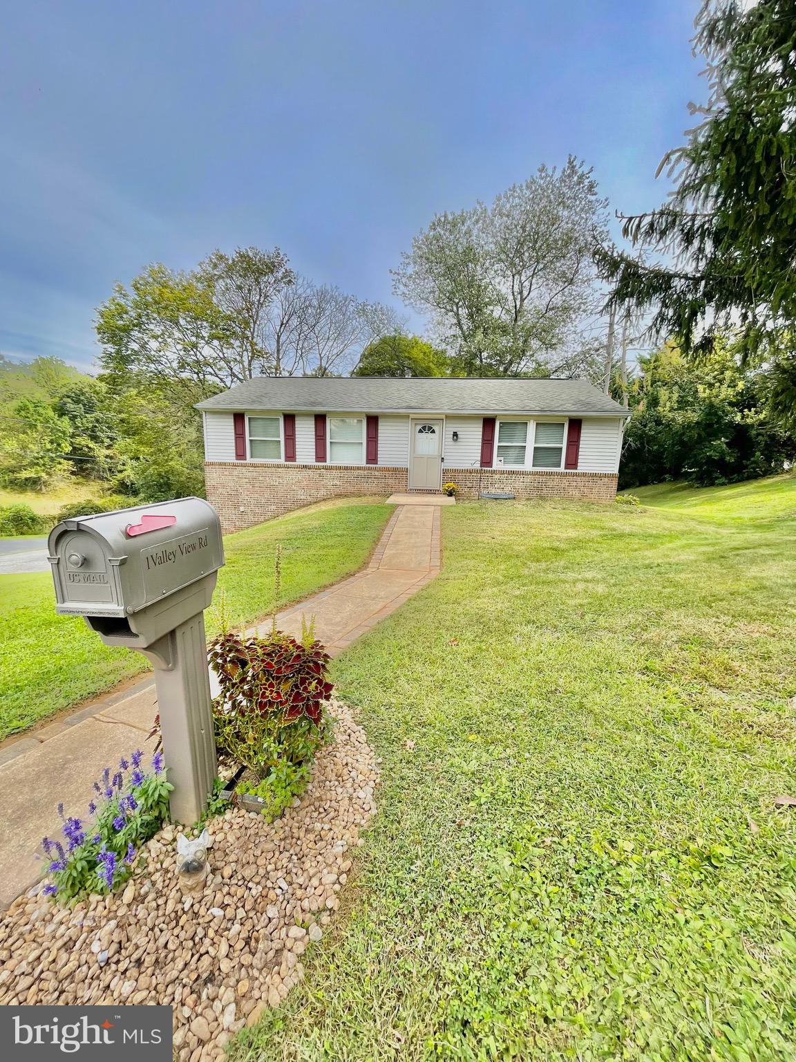 1 Valley View Road York, PA 17403 - Photo 2 of 40 a front view of a house with a yard