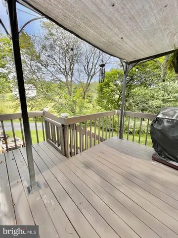 a view of a house with a big yard