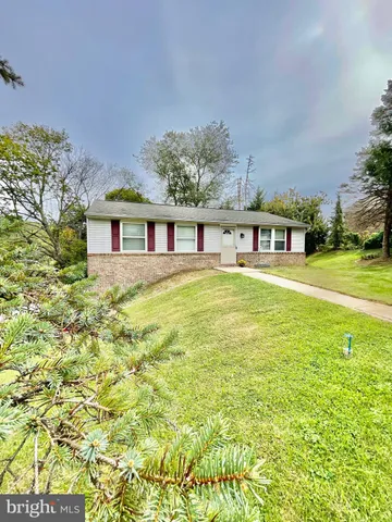 a view of swimming pool with outdoor seating and yard