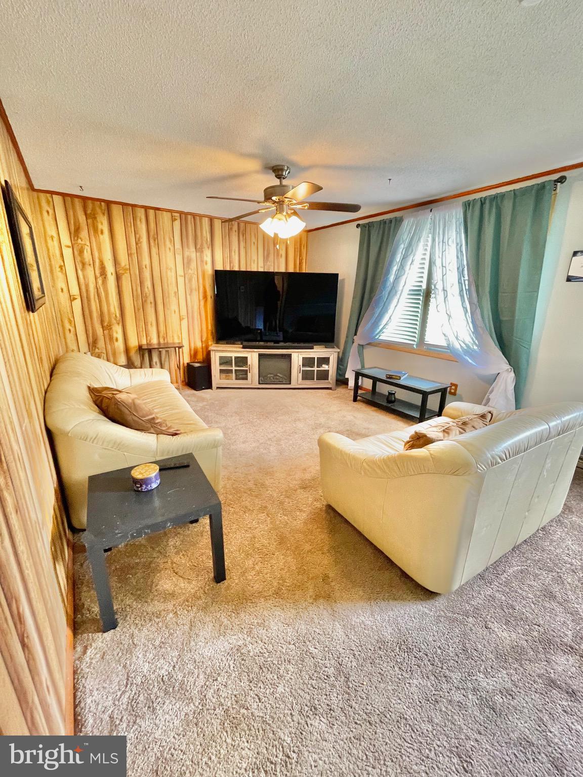 1 Valley View Road York, PA 17403 - Photo 7 of 40 a living room with furniture and a flat screen tv