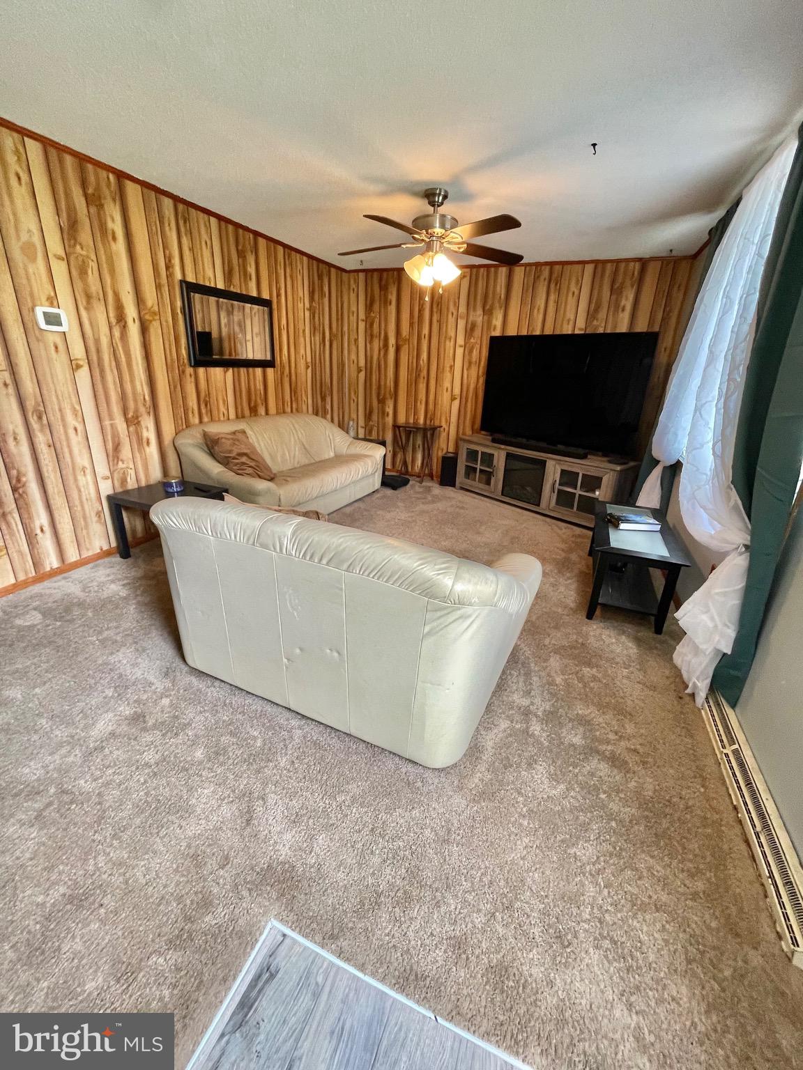 1 Valley View Road York, PA 17403 - Photo 8 of 40 a living room with furniture and a flat screen tv