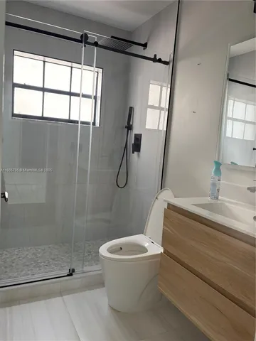 a view of a backyard of the house