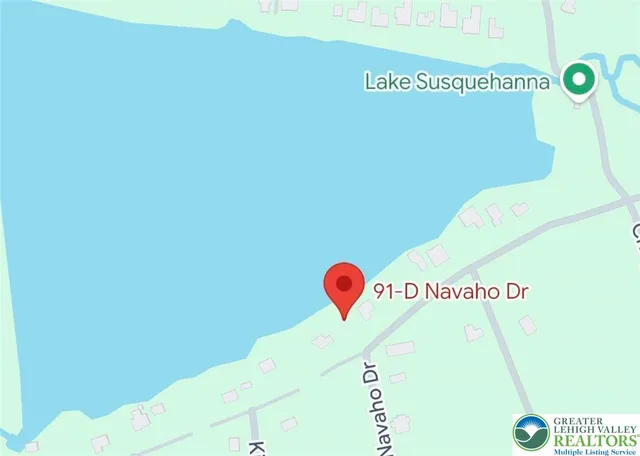 a sign on the side of a street