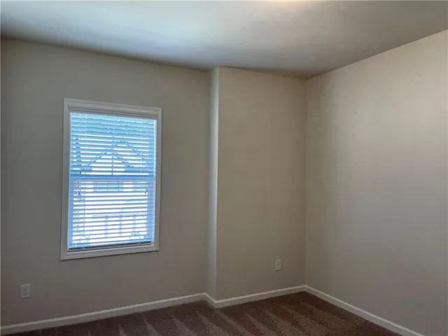 a view of a house with a swimming pool