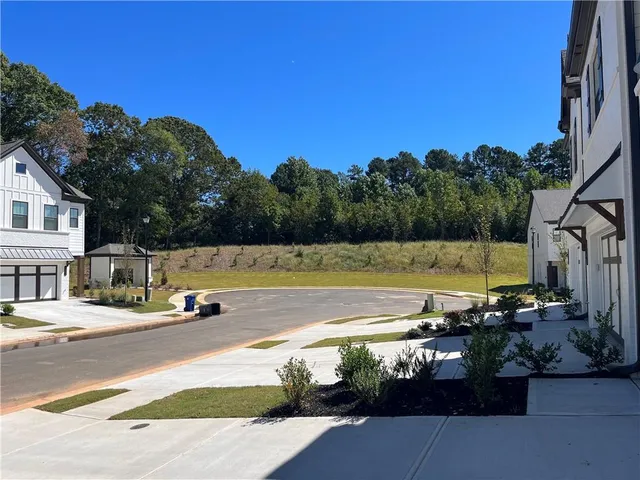 a view of an ocean with a house