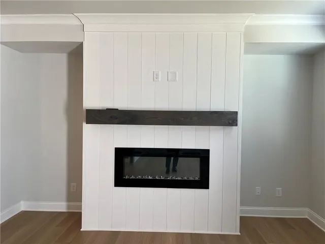 a hallway with a fireplace