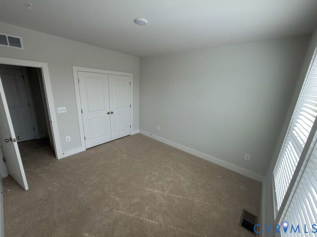 3605 Edna Path, Unit A Henrico, VA 23233 - Photo 11 of 20 an empty room with windows