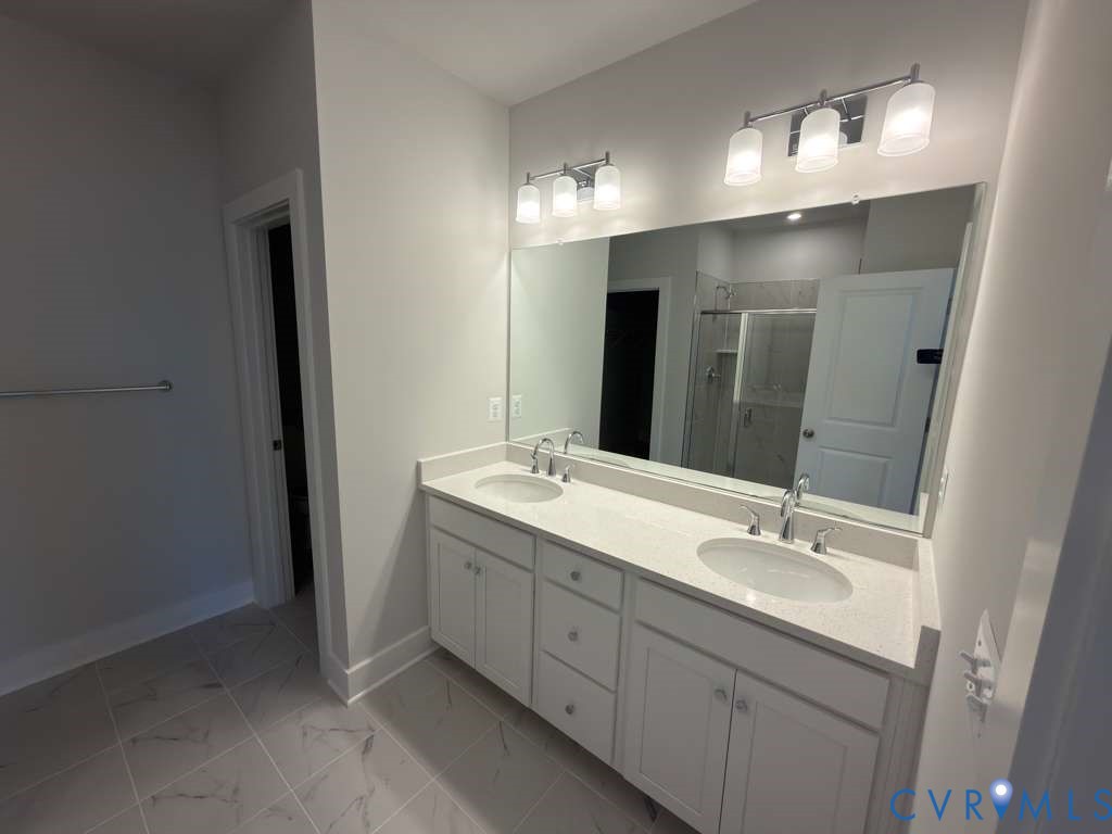3605 Edna Path, Unit A Henrico, VA 23233 - Photo 13 of 20 a bathroom with a double vanity sink and a mirror