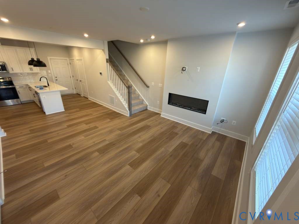 3605 Edna Path, Unit A Henrico, VA 23233 - Photo 6 of 20 a view of an empty room with wooden floor