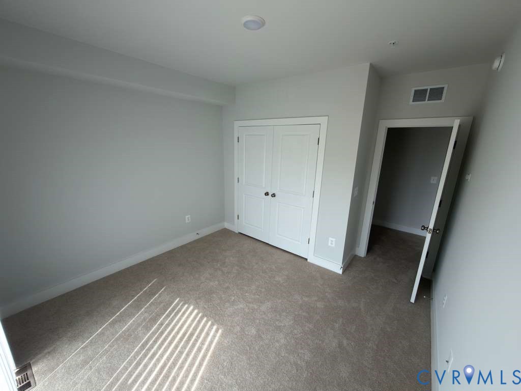 3605 Edna Path, Unit A Henrico, VA 23233 - Photo 8 of 20 an empty room with windows