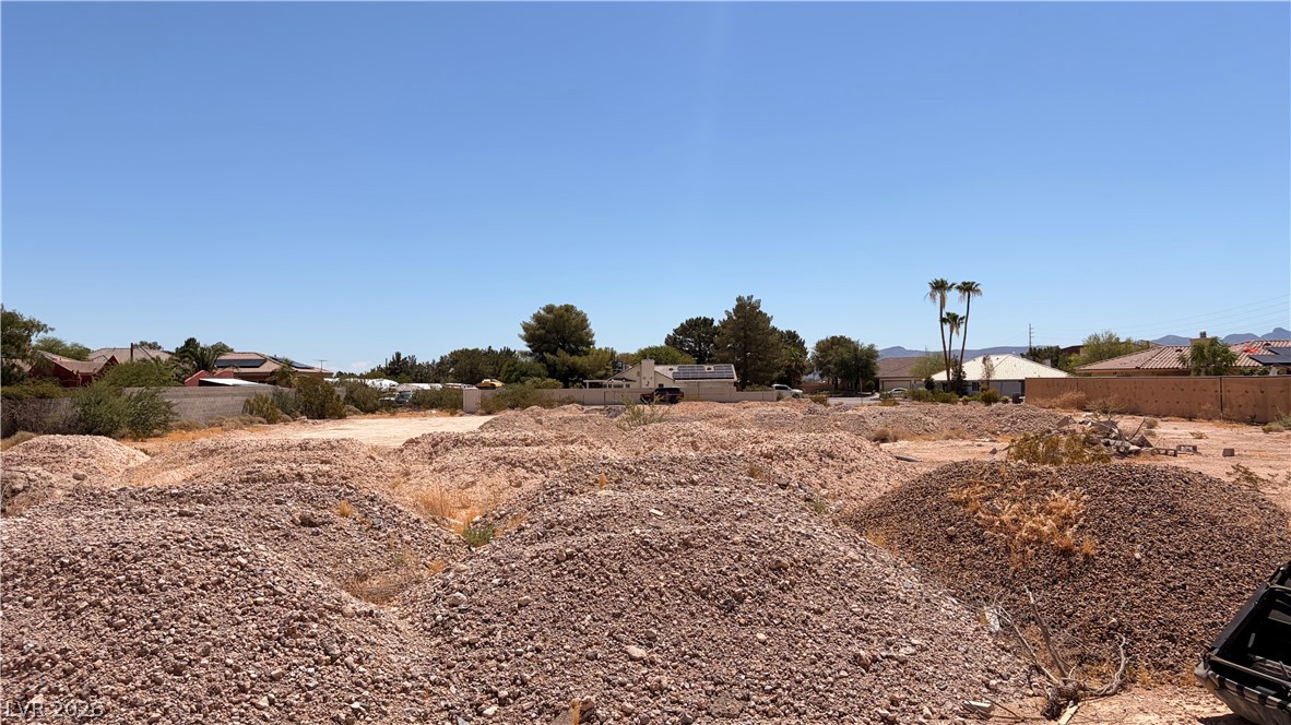 8811 Rancho Destino Road Las Vegas, NV 89123 - Photo 6 of 10 A spacious, buildable lot awaits your custom home vision amidst desert landscaping.