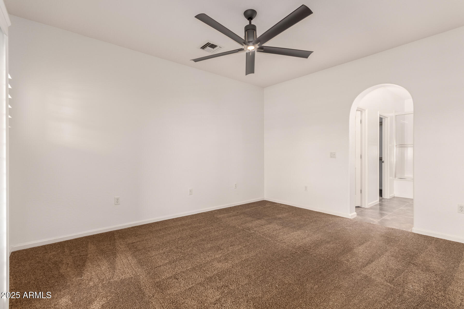 3935 East Rough Rider Road, Unit 1076 Phoenix, AZ 85050 - Photo 16 of 48 wooden floor in an empty room