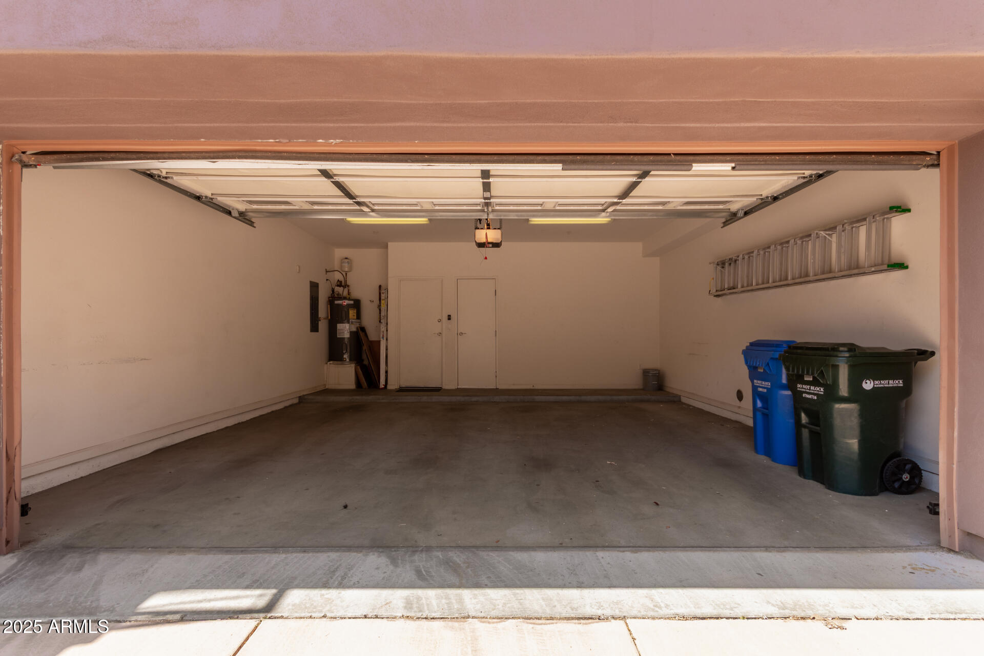 3935 East Rough Rider Road, Unit 1076 Phoenix, AZ 85050 - Photo 31 of 48 a view of a garage