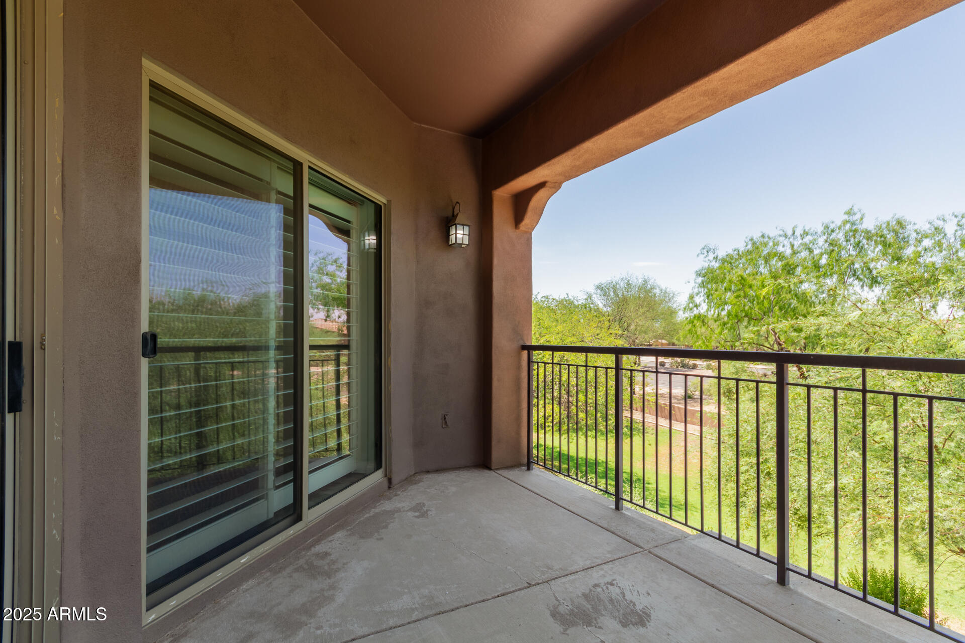 3935 East Rough Rider Road, Unit 1076 Phoenix, AZ 85050 - Photo 32 of 48 a balcony with view of balcony
