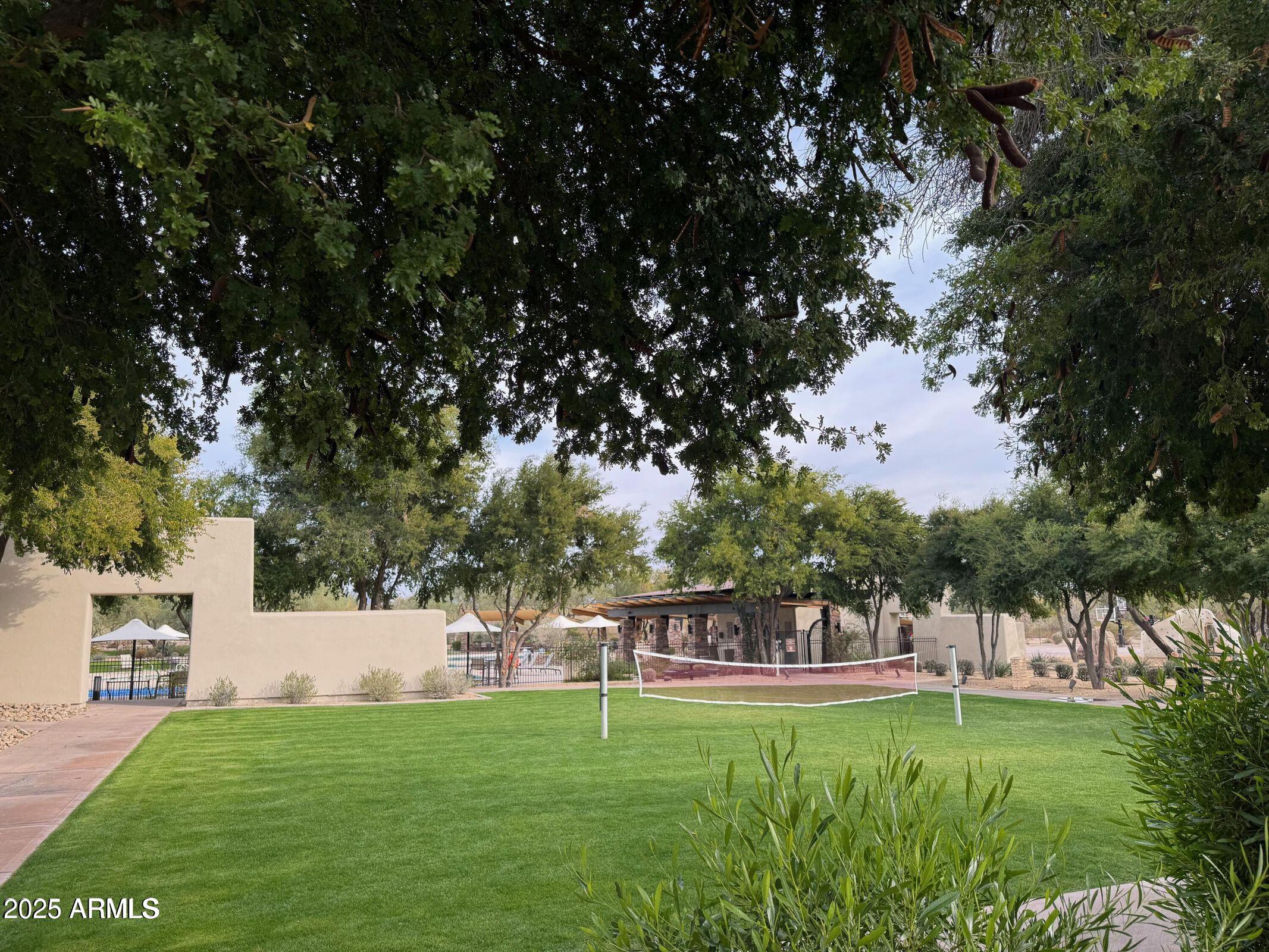 3935 East Rough Rider Road, Unit 1076 Phoenix, AZ 85050 - Photo 47 of 48 a view of a back yard