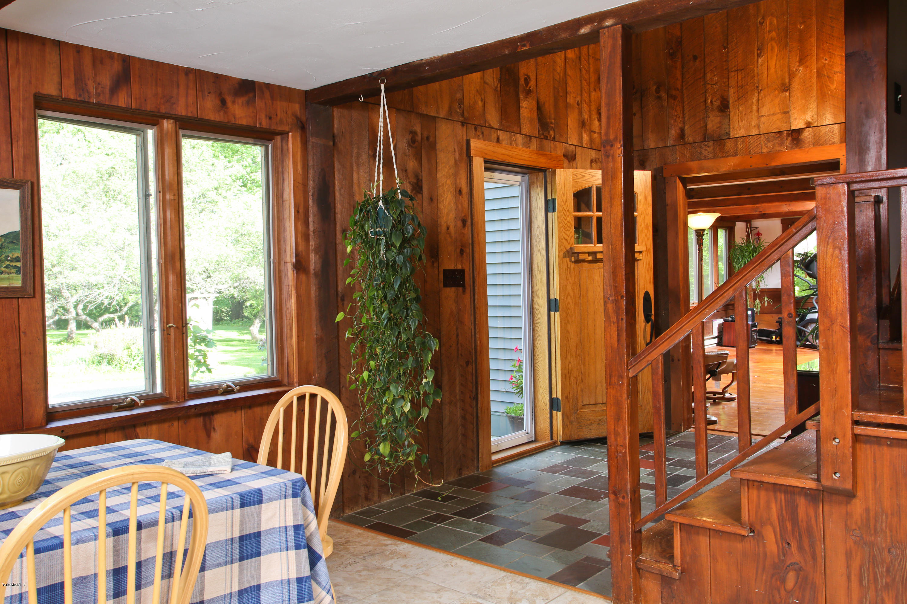 32 White Road Colrain, MA 01340 - Photo 14 of 34 a front view of a house with entryway and wooden floor