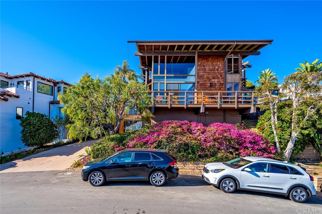 1944 Ocean Way Laguna Beach, CA 92651 - Photo 21 of 25 a car parked in front of a house