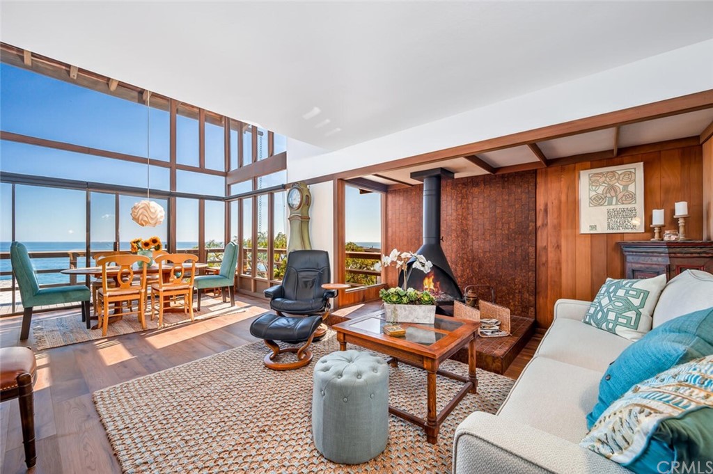 1944 Ocean Way Laguna Beach, CA 92651 - Photo 5 of 25 a living room with furniture a rug and a large window