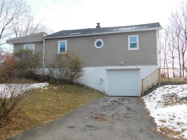24 Cooper Road Poughkeepsie, NY 12603 - Photo 1 of 1 Snow covered property with a garage
