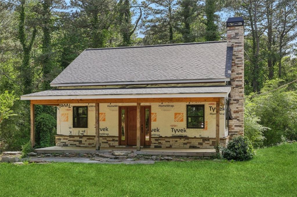 front view of house with a yard