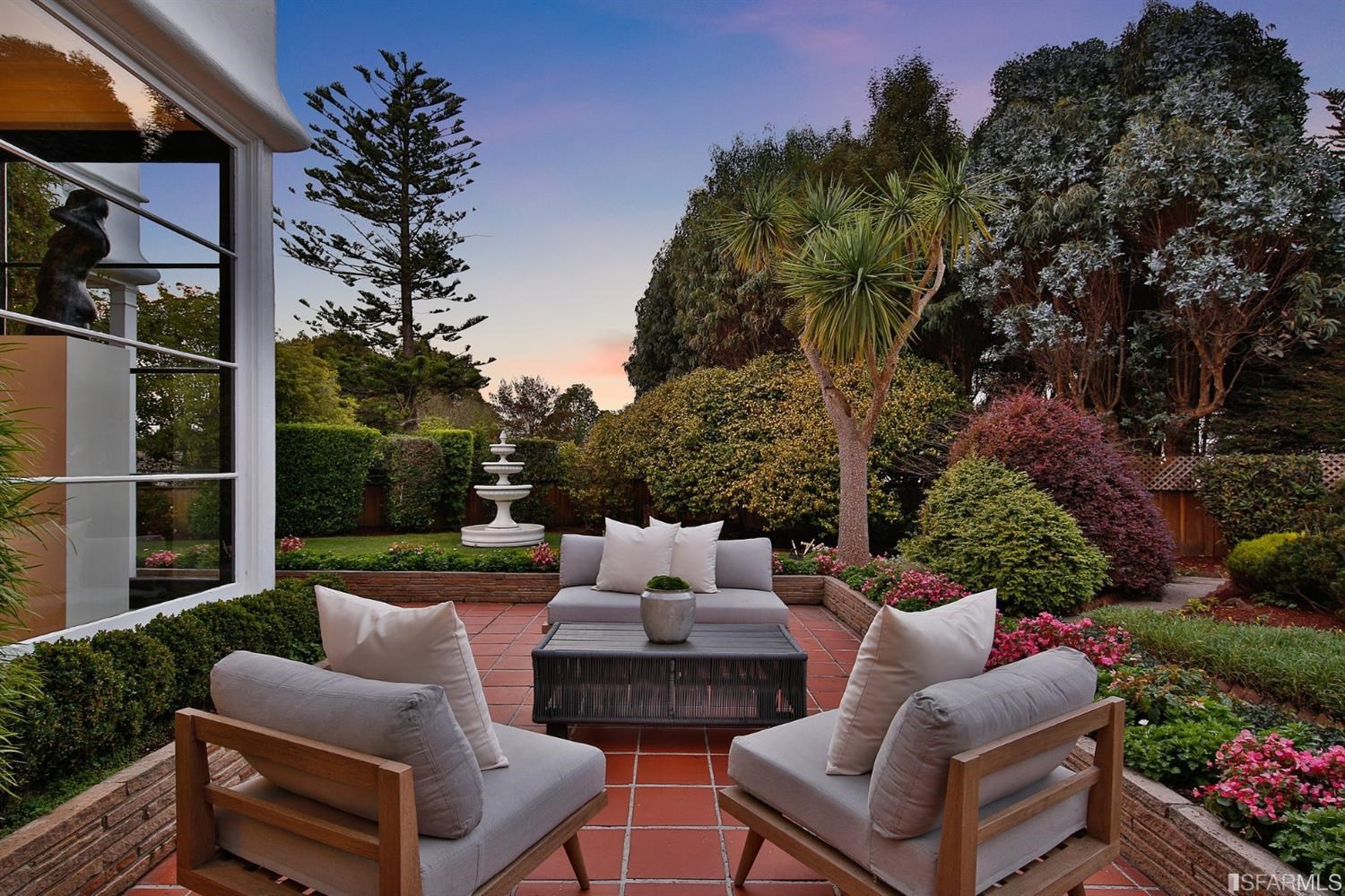 100 Stonecrest Drive San Francisco, CA 94132 - Photo 16 of 98 a view of a patio with couches table and chairs and potted plants