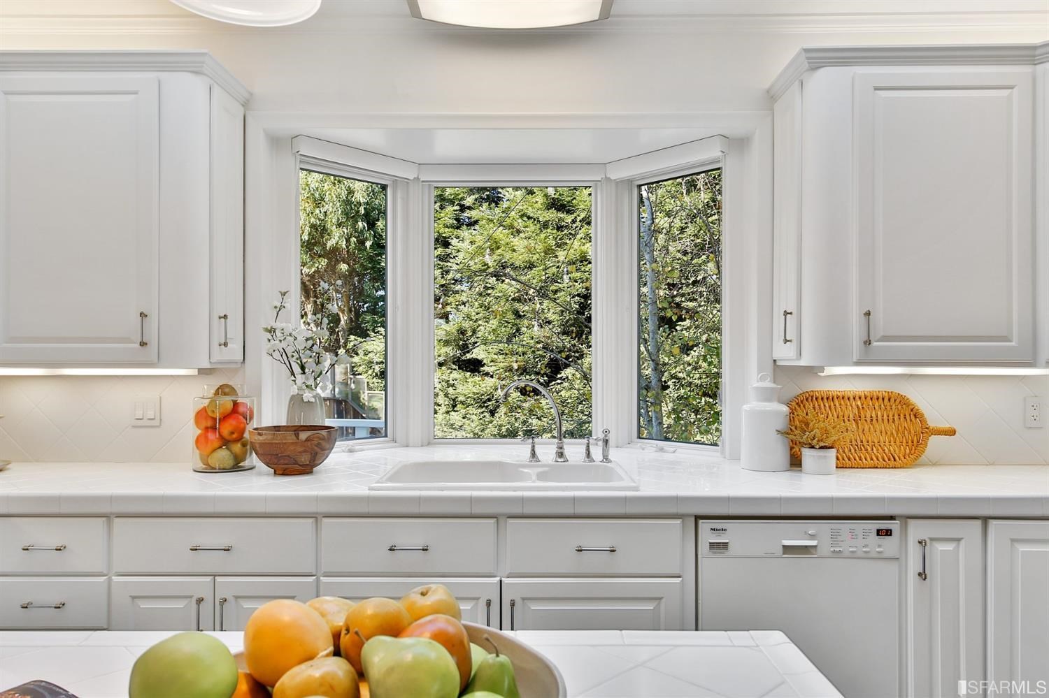100 Stonecrest Drive San Francisco, CA 94132 - Photo 40 of 98 a kitchen with a window a sink and cabinets