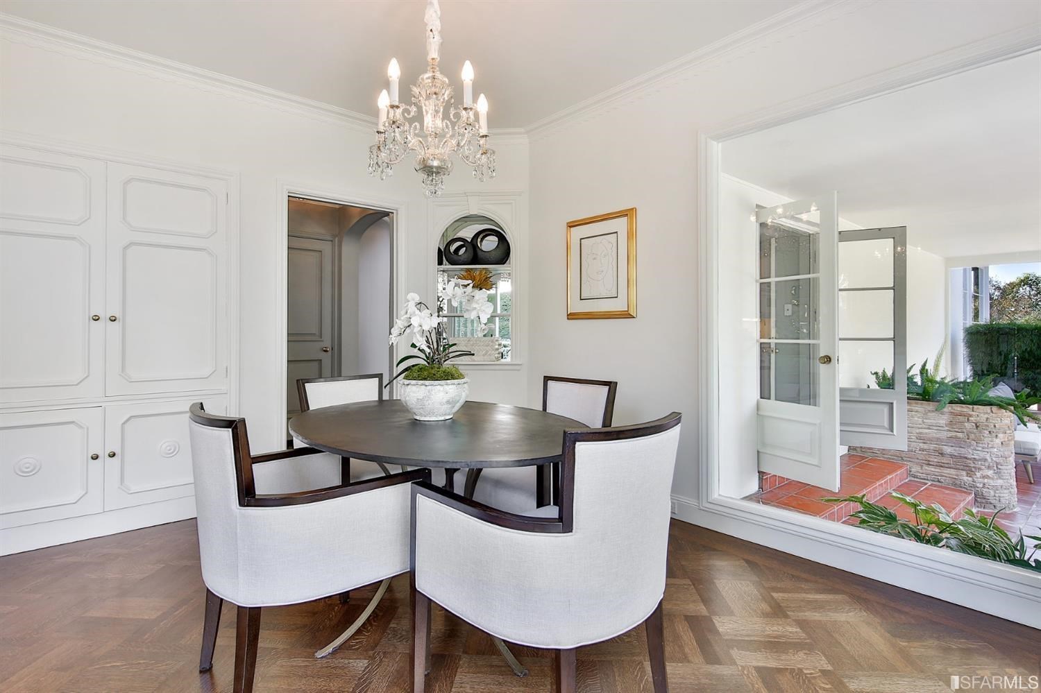 100 Stonecrest Drive San Francisco, CA 94132 - Photo 43 of 98 a view of a dining room with furniture and chandelier