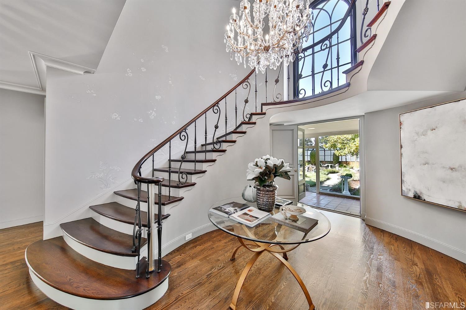 100 Stonecrest Drive San Francisco, CA 94132 - Photo 44 of 98 a living room with furniture and a chandelier