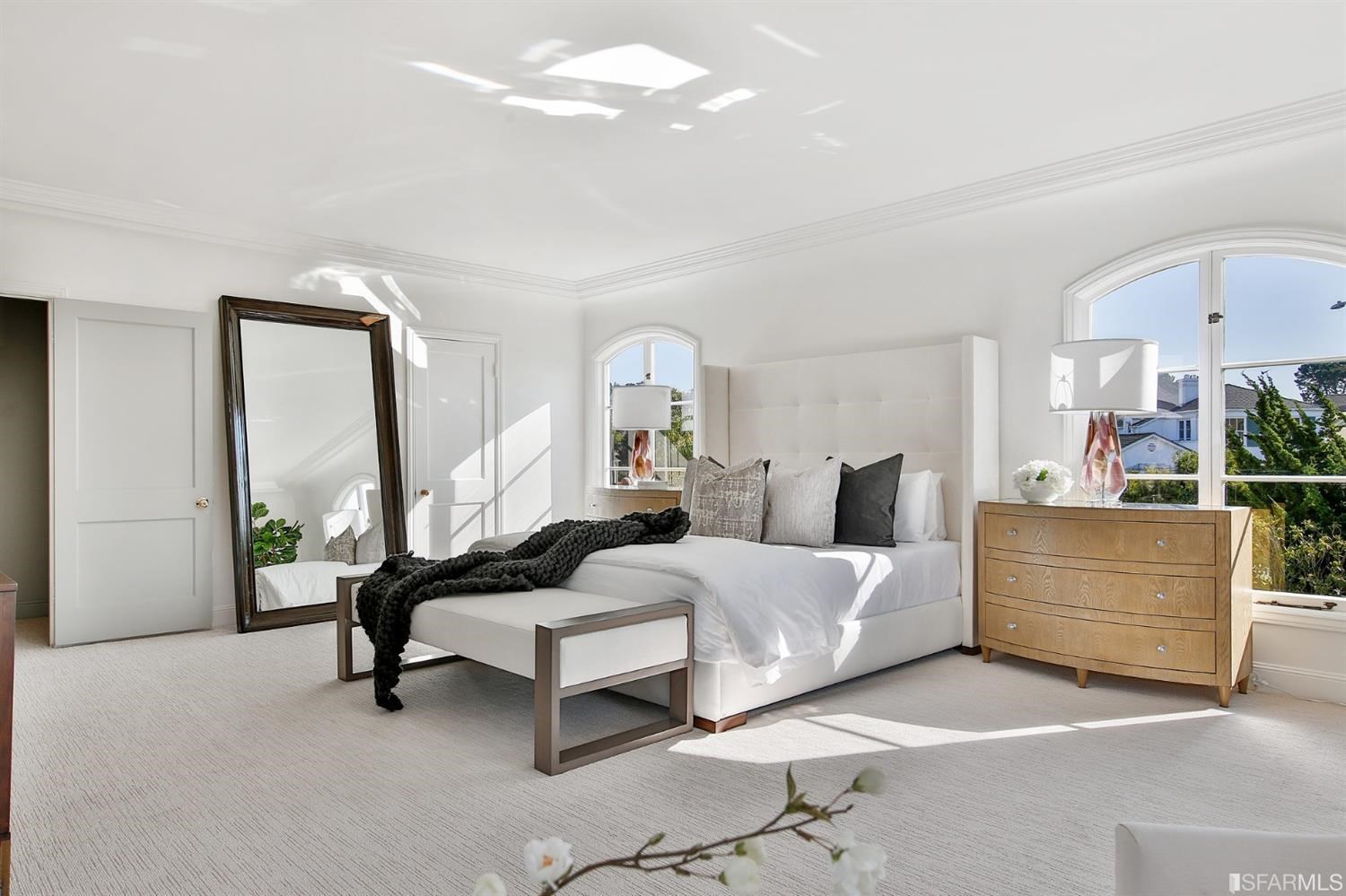 100 Stonecrest Drive San Francisco, CA 94132 - Photo 53 of 98 a spacious bedroom with a bed and a large window