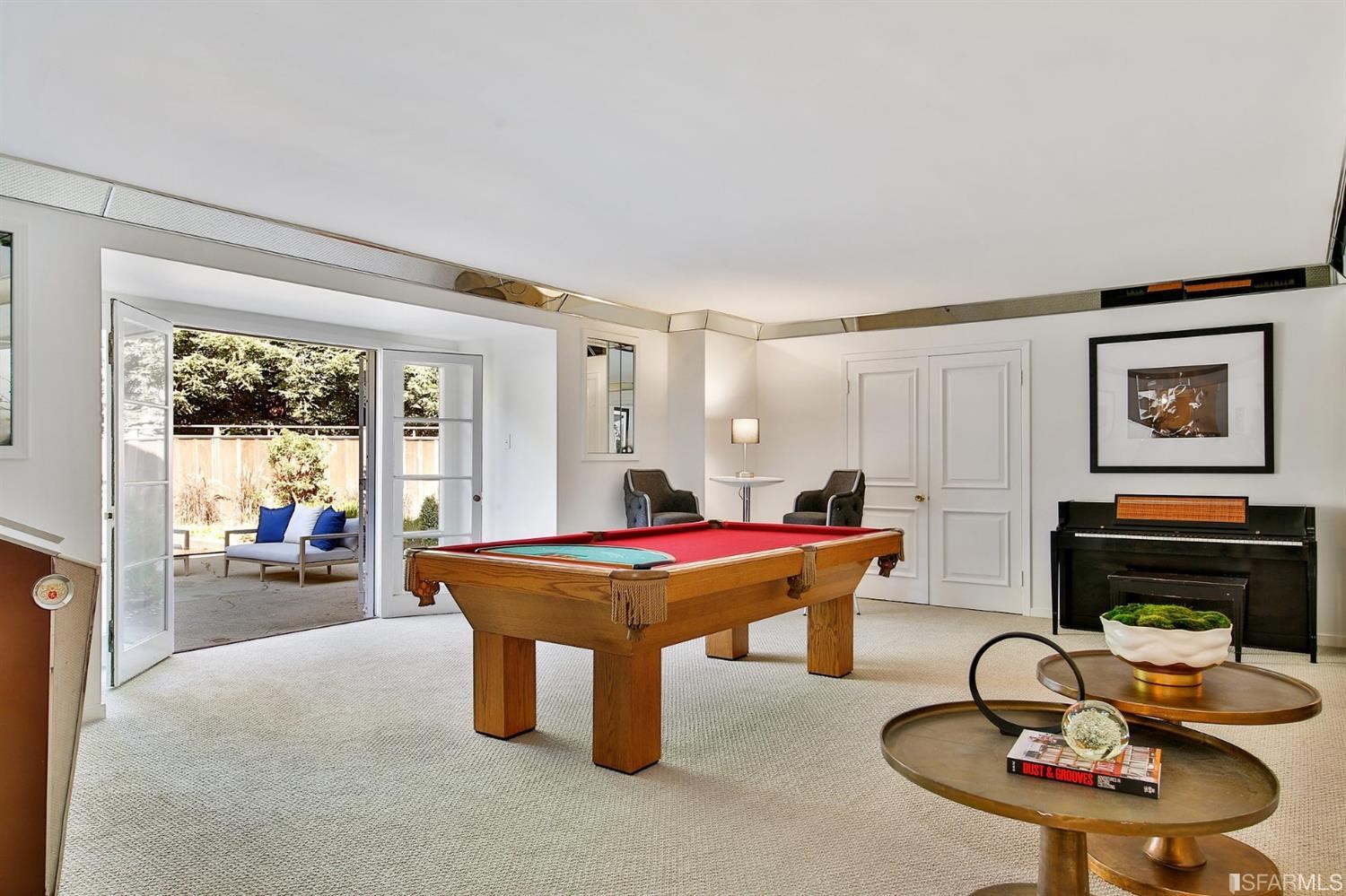 100 Stonecrest Drive San Francisco, CA 94132 - Photo 76 of 98 a room with furniture and a fireplace