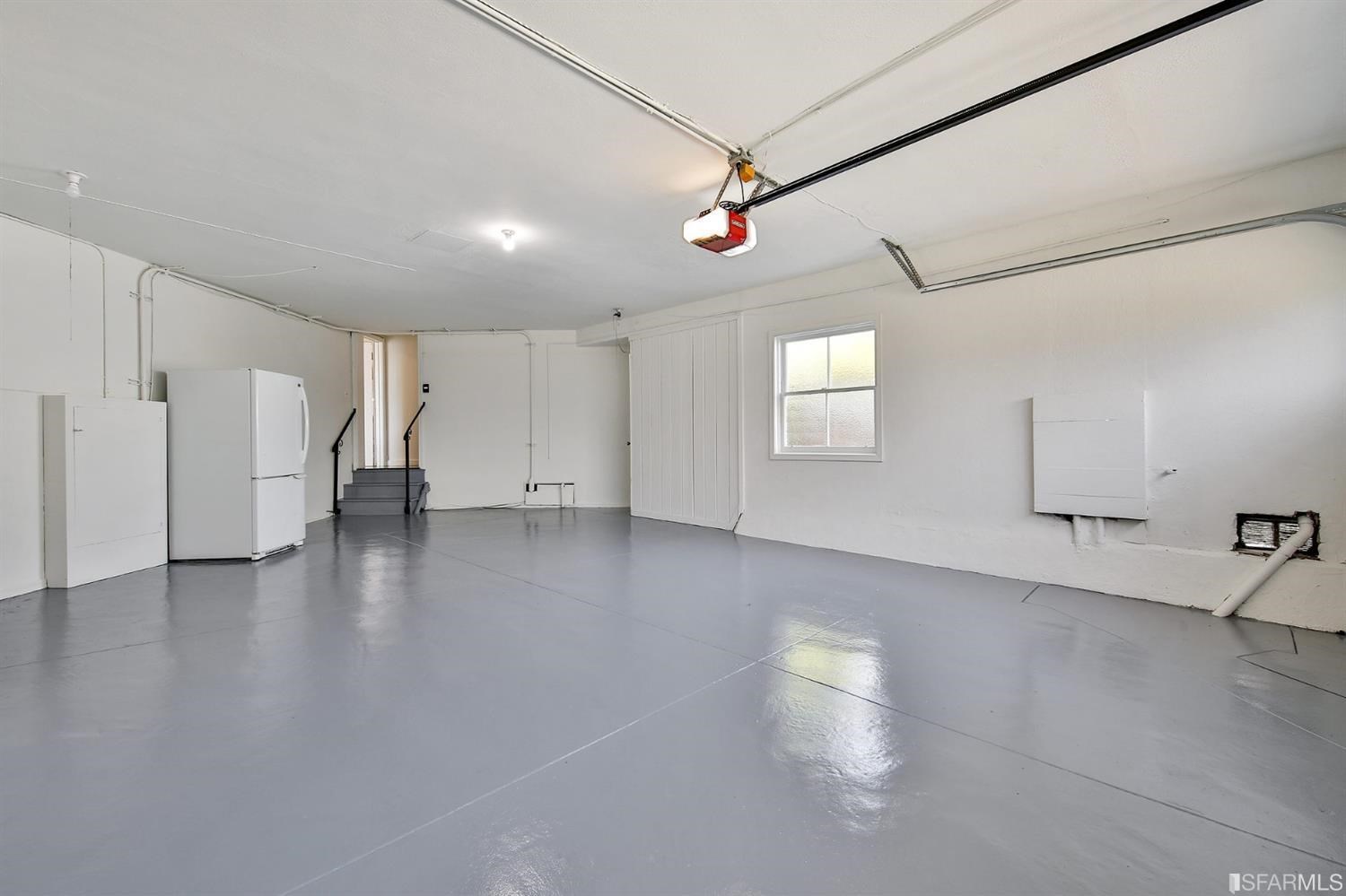 100 Stonecrest Drive San Francisco, CA 94132 - Photo 84 of 98 wooden floor in an empty room with a window