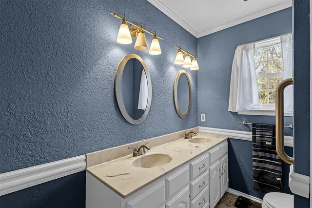 a view of a livingroom with furniture and a fireplace