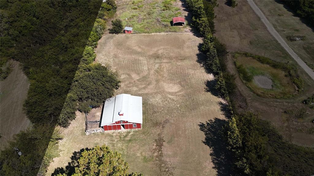 1495 Snider Lane Lucas, TX 75002 - Photo 38 of 39 an aerial view of a house with a yard and a large tree