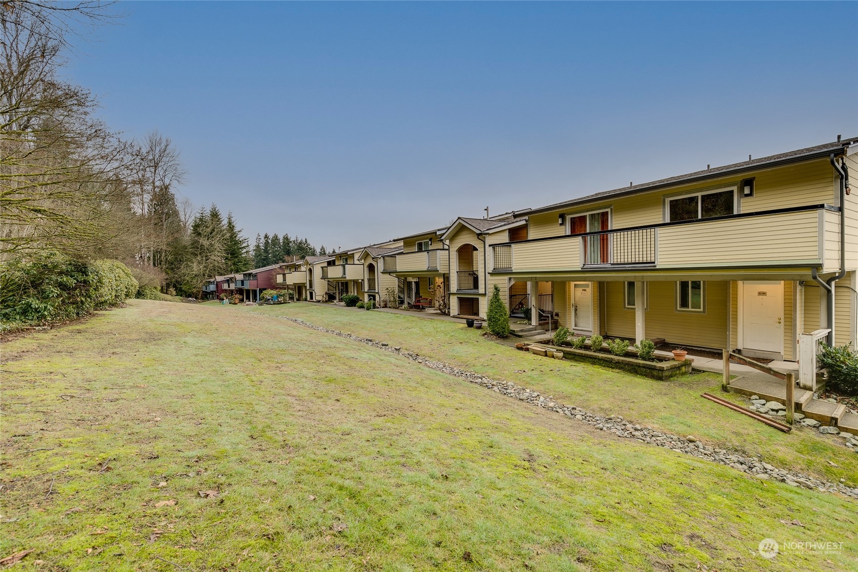 15711 Waynita Way Northeast, Unit H203 Bothell, WA 98011 - Photo 3 of 22 a front view of house with yard