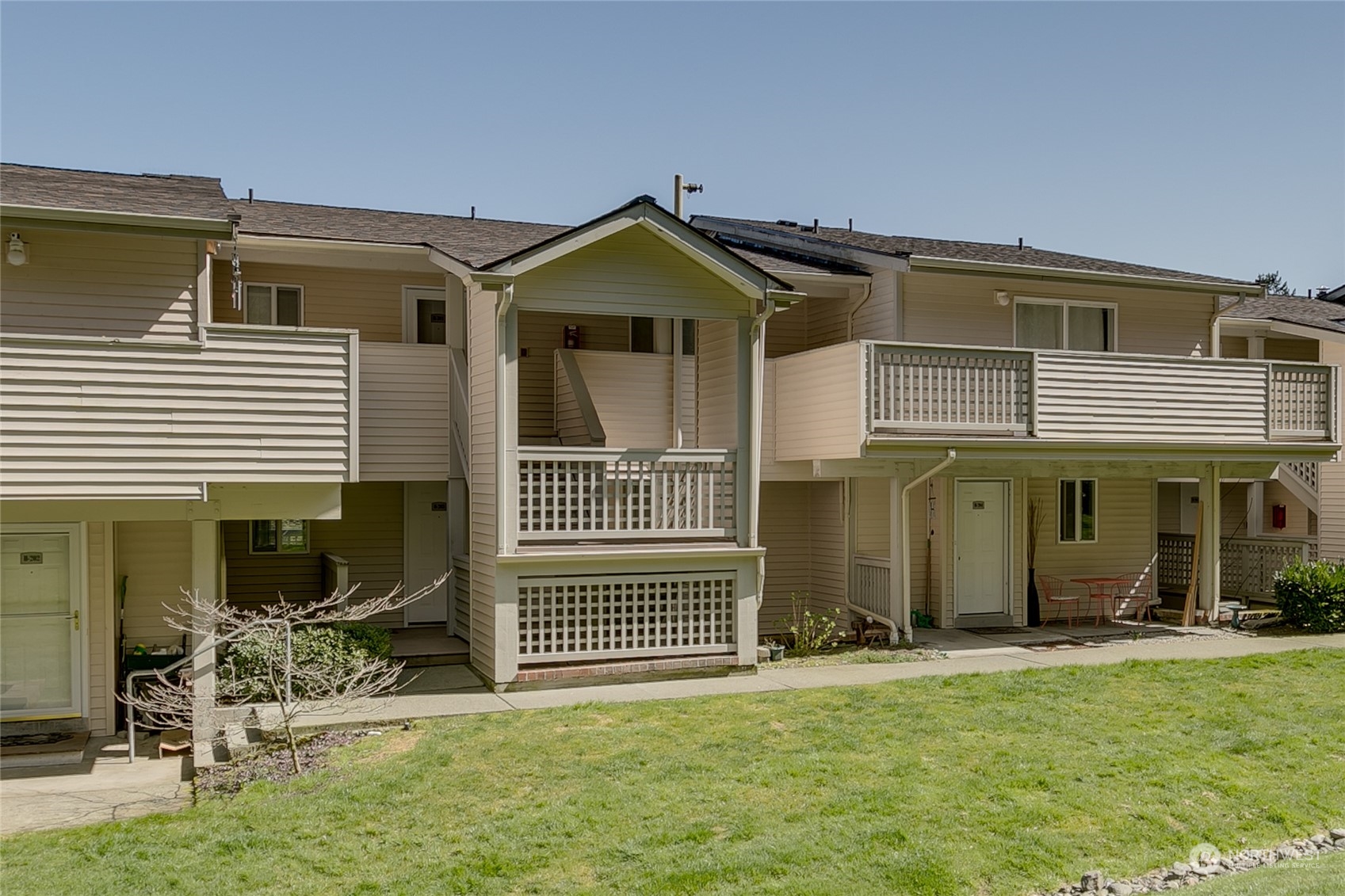 15711 Waynita Way Northeast, Unit H203 Bothell, WA 98011 - Photo 5 of 22 a house view with a outdoor space