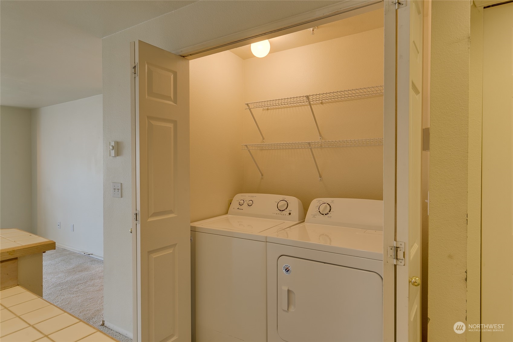 15711 Waynita Way Northeast, Unit H203 Bothell, WA 98011 - Photo 10 of 22 a utility room with dryer and washer