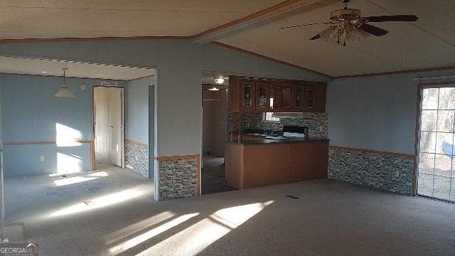 2331 Kesler Road Carnesville, GA 30521 - Photo 25 of 50 a open kitchen with a sink and dishwasher a oven with a large window