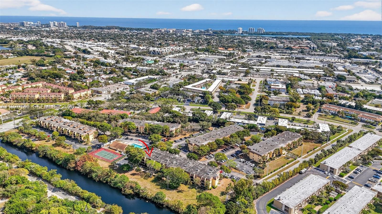 450 Northwest 20th Street, Unit 2120 Boca Raton, FL 33431 - Photo 25 of 27 an aerial view of residential houses with outdoor space