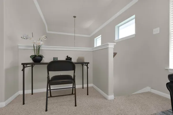 a view of a livingroom with furniture