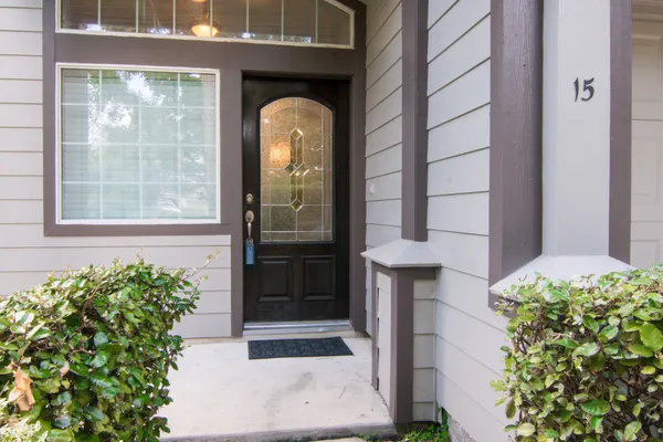 a front view of a house with a glass door