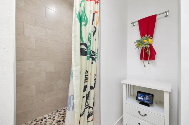 a view of storage and utility room with washer and dryer