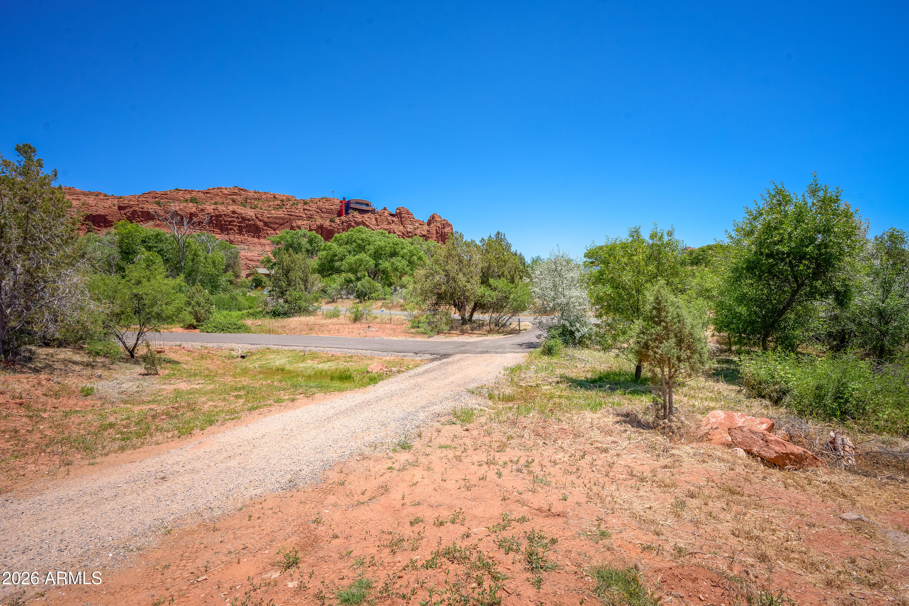 3155 Red Rock Loop Road, Unit 1 Sedona, AZ 86336 - Photo 17 of 18 a view of a yard