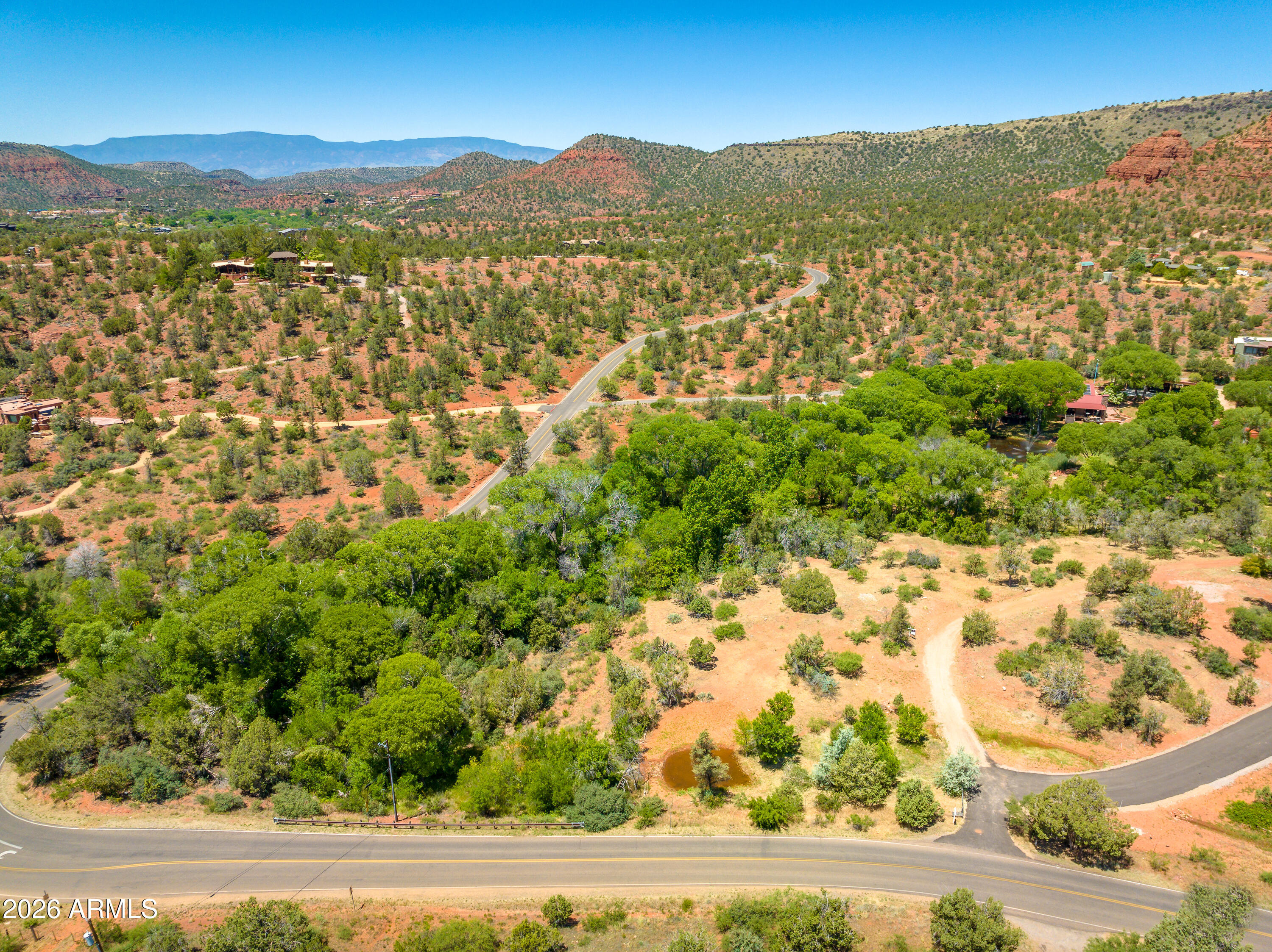 3155 Red Rock Loop Road, Unit 1 Sedona, AZ 86336 - Photo 7 of 18 a view of a city with mountain view