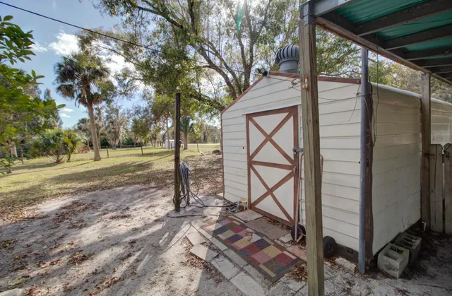 a view of house with outdoor space and street view