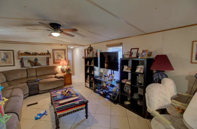 a room with gym equipment and a rug