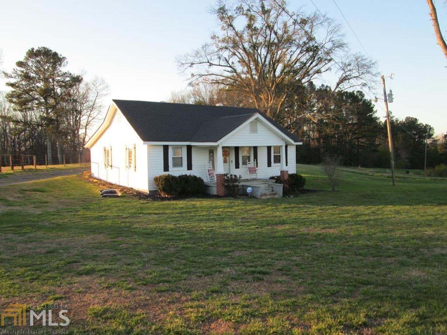 245 Dot Road Bowdon, GA 30108 - Photo 1 of 1 a front view of a house with a garden