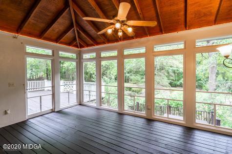 113 Hampton Ridge Road Macon, GA 31220 - Photo 17 of 29 a view of an empty room with wooden floor and a large window